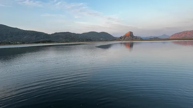 A rocky hill above the delta at twilight A rocky hill above the delta at twilight
